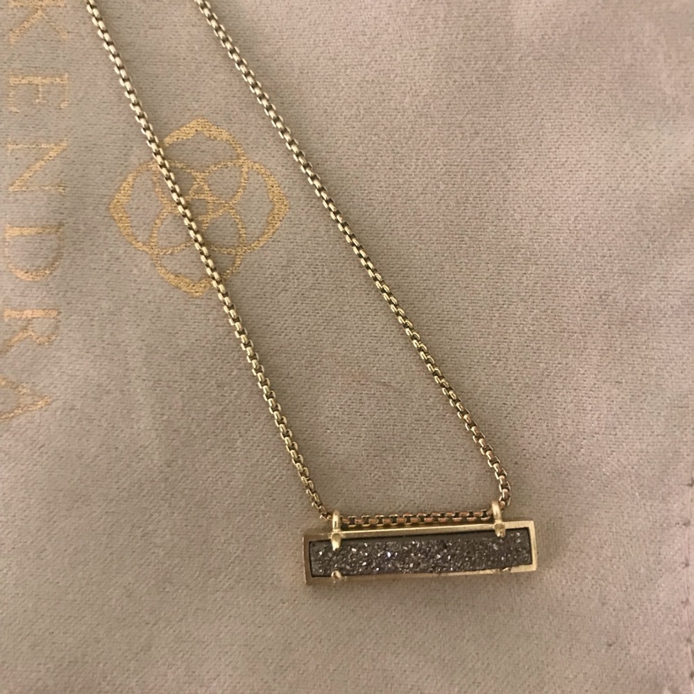 Kendra Scott gold and gray druzy necklace.